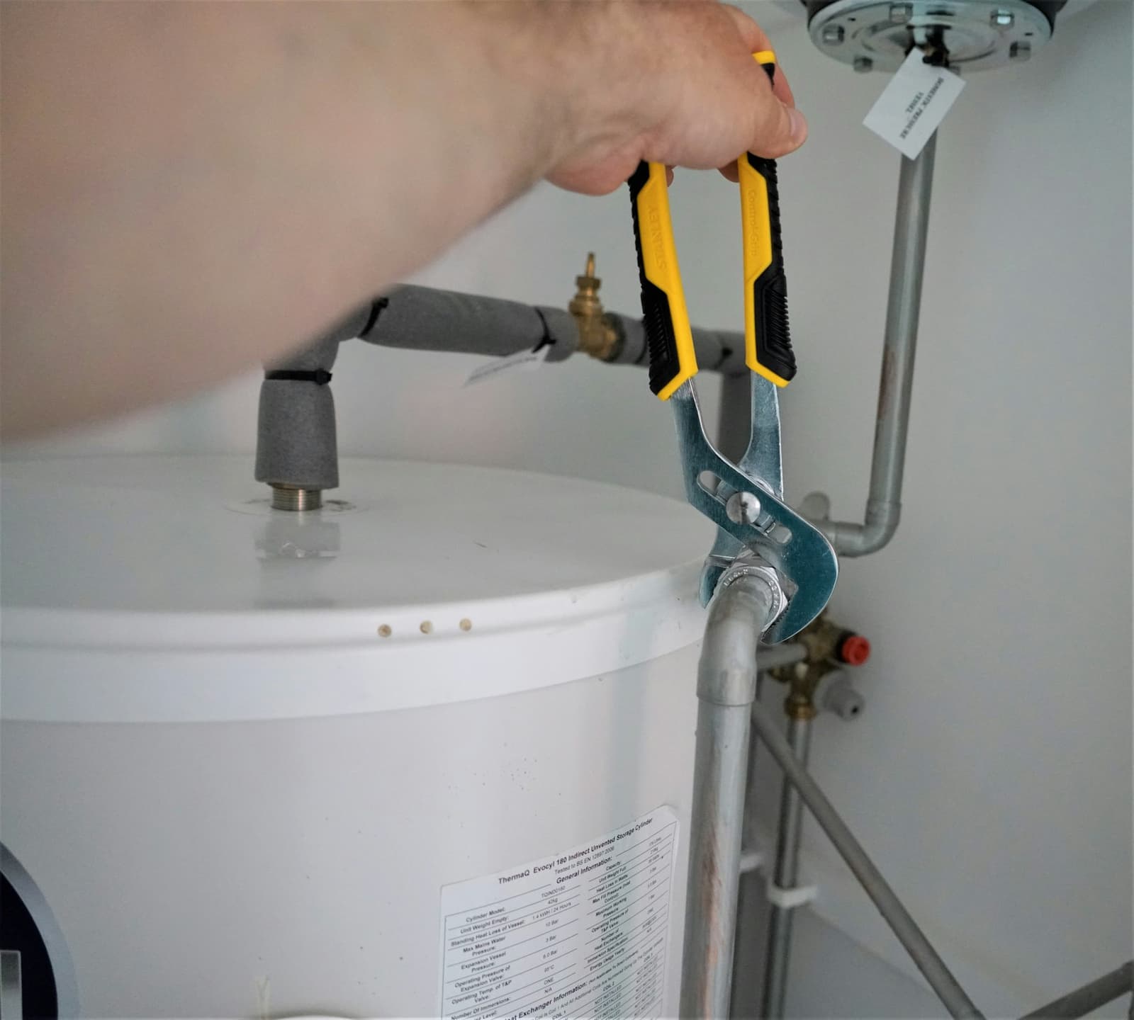 A wrench on boiler pipework